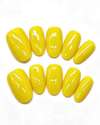 24 Solid Colors — yellow press-on nail set, full set view