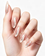 Nude Pink Shimmer Crystal Nails — press-on nails worn on hand, close view