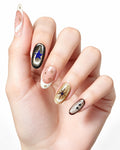 Golden Cat-Eye Star French Nails — press-on nails worn on hand, close view