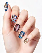 Christmas Fantasy — press-on nails worn on hand, close view