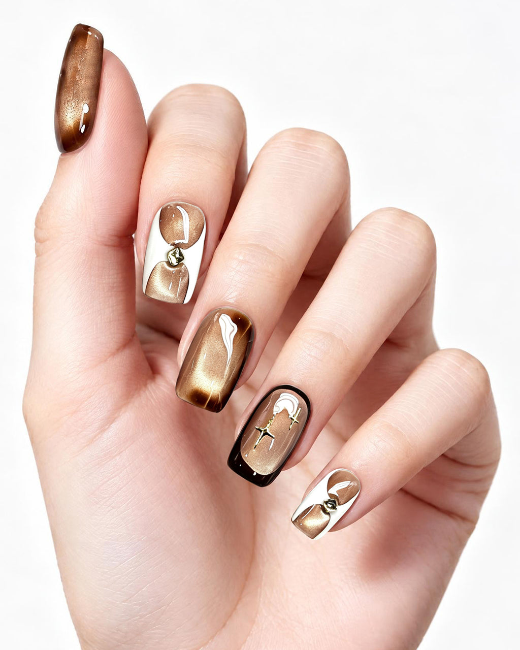 Golden Mocha Cat-Eye — press-on nails worn on hand, close view