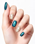 Oceanic Muse | Oceanic Muse | Teal Cat-Eye Polka Dot Nails — press-on nails worn on hand, close view