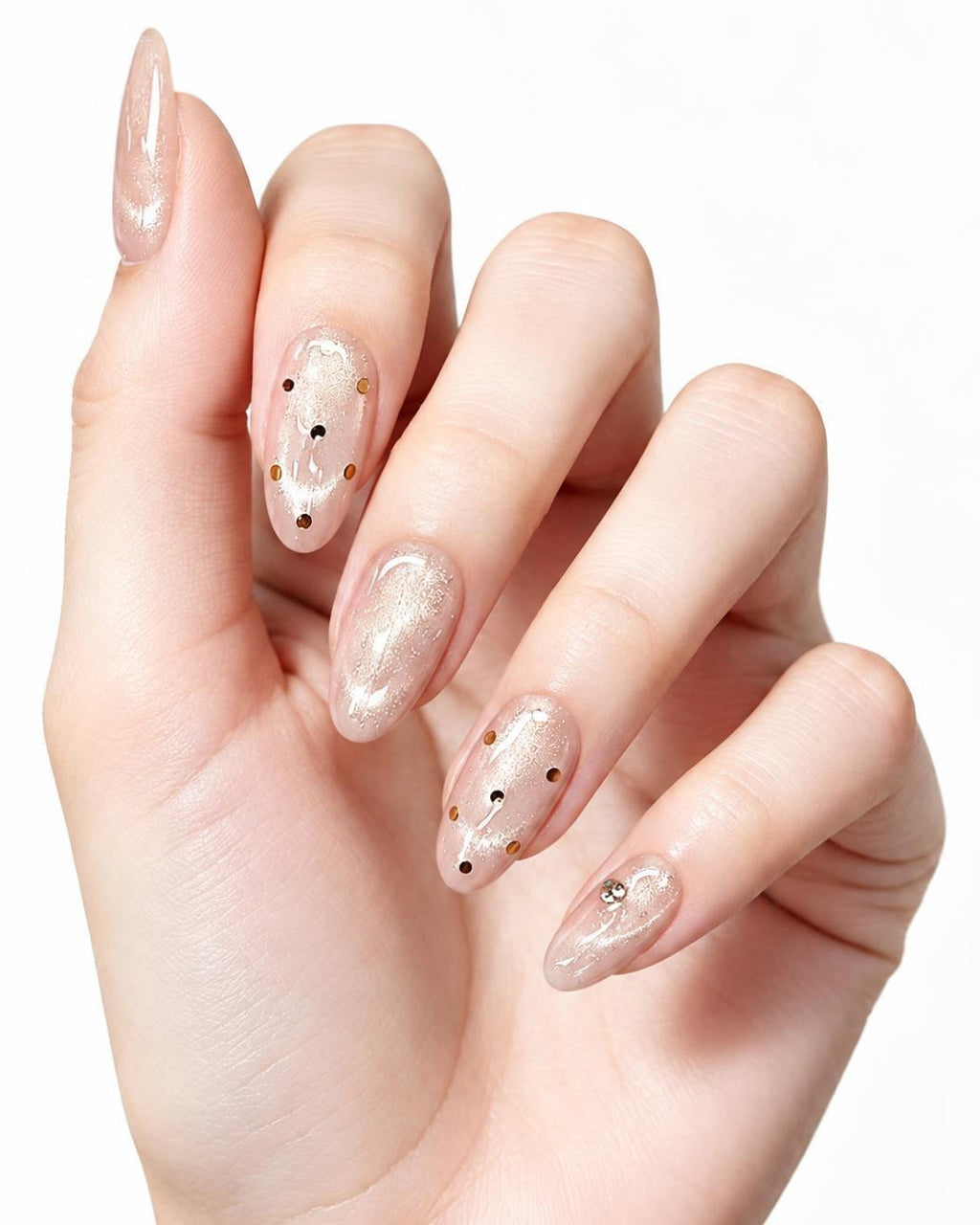 Champagne Dew — press-on nails worn on hand, close view