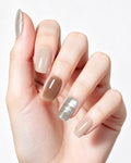 Caramel Latte — press-on nails worn on hand, close view