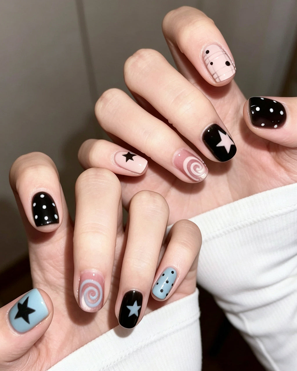 Y2K Star — press-on nails worn on hand, alternate angle