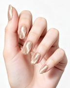 Champagne Glazed Pearl — press-on nails worn on hand, close view