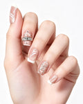 Coquette Glamour | Rose Nude Cat-Eye with 3D Ribbon & Quilte — press-on nails worn on hand, close view