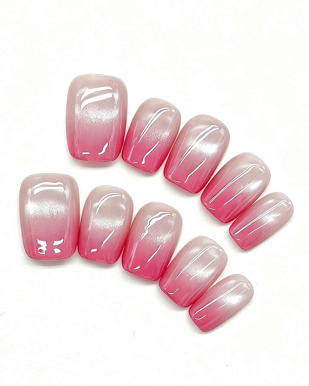 Blush Pink Ombre French — pink press-on nail set, full set, styled arrangement