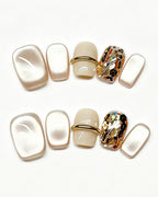 Soft & Versatile — gold press-on nail set, product detail view