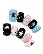 Y2K Star — black press-on nail set, full set, styled arrangement