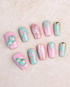 Blessing & Prosperity — press-on nails worn on hand, close view