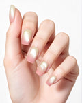 Gradient Guava — press-on nails worn on hand, close view