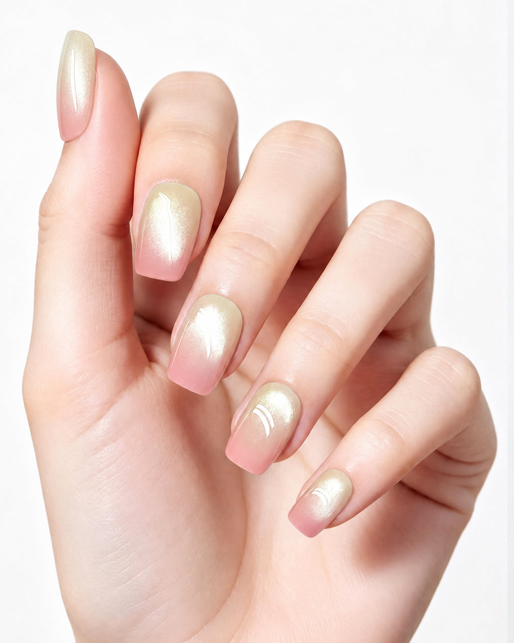 Gradient Guava — press-on nails worn on hand, close view