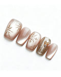 Champagne Gold Cat Eye — gold press-on nail set, full set, styled arrangement