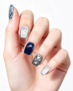 Blue Ocean — press-on nails worn on hand, close view