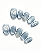 Steel Blue Cat-Eye Dewdrop — press-on nail set, full set, styled arrangement