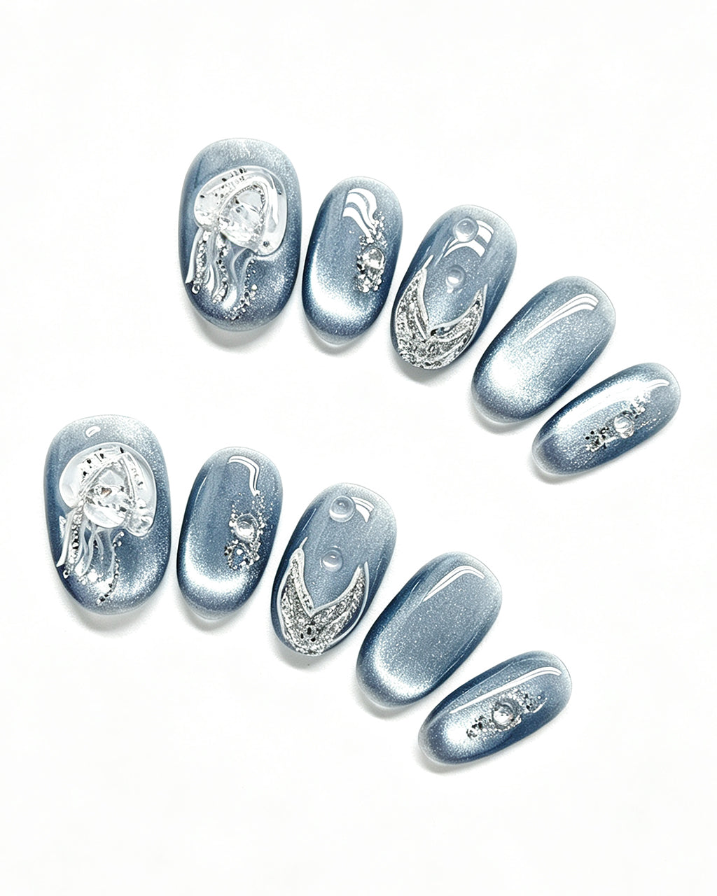Steel Blue Cat-Eye Dewdrop — press-on nail set, full set, styled arrangement