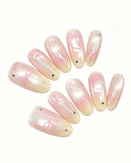 Soft Peach Blush Crystal — press-on nail set, full set, styled arrangement