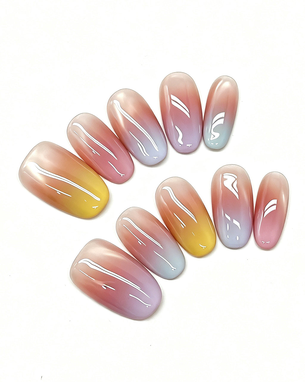 Sunset Mirage — pink press-on nail set, full set, styled arrangement