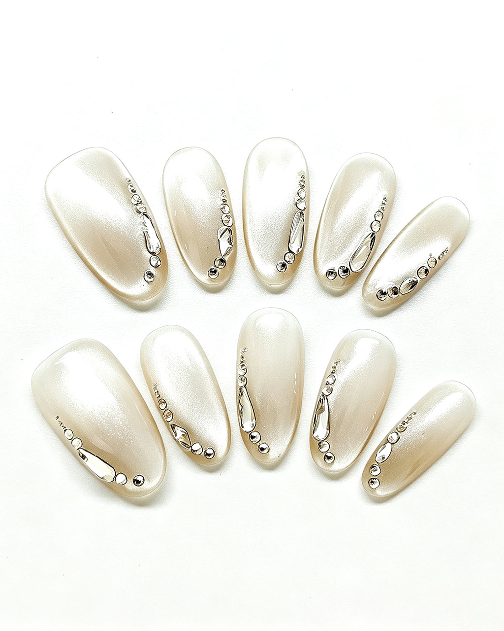 Silver Cat-Eye Crystal Chrome Nails — press-on nail set, full set, styled arrangement