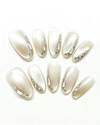 Silver Cat-Eye Crystal Chrome Nails — press-on nail set, full set, styled arrangement