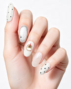 Peachy Diary — press-on nails worn on hand, close view