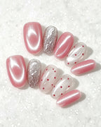 Cherry Pink Jelly — pink press-on nail set, full set, styled arrangement