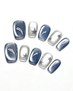Star Flecks — blue press-on nail set, full set, styled arrangement