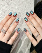 Deep Ocean — gold press-on nail set, full set, styled arrangement