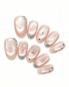 Celestial Stars & Nude Cat-Eye — press-on nail set, full set, styled arrangement