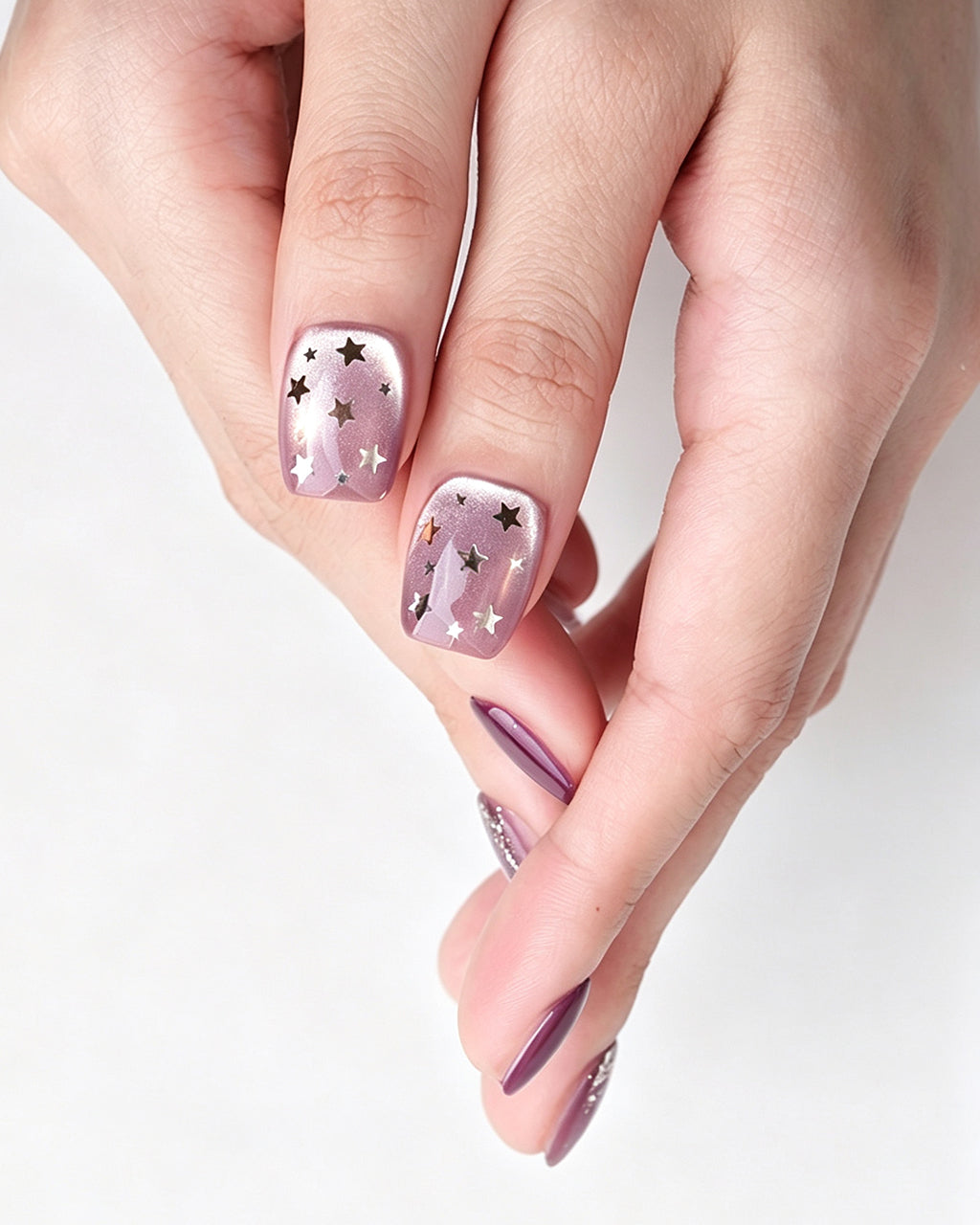 Dusty Rose Cat Eye — press-on nails worn on hand, alternate angle