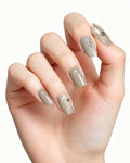 Minimalist Gray — press-on nails worn on hand, close view