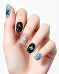 Y2K Star — press-on nails worn on hand, close view
