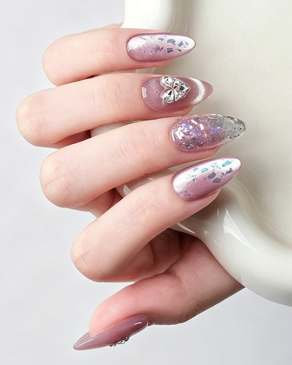 Lavender Lilac Cat Eye — press-on nails worn on hand