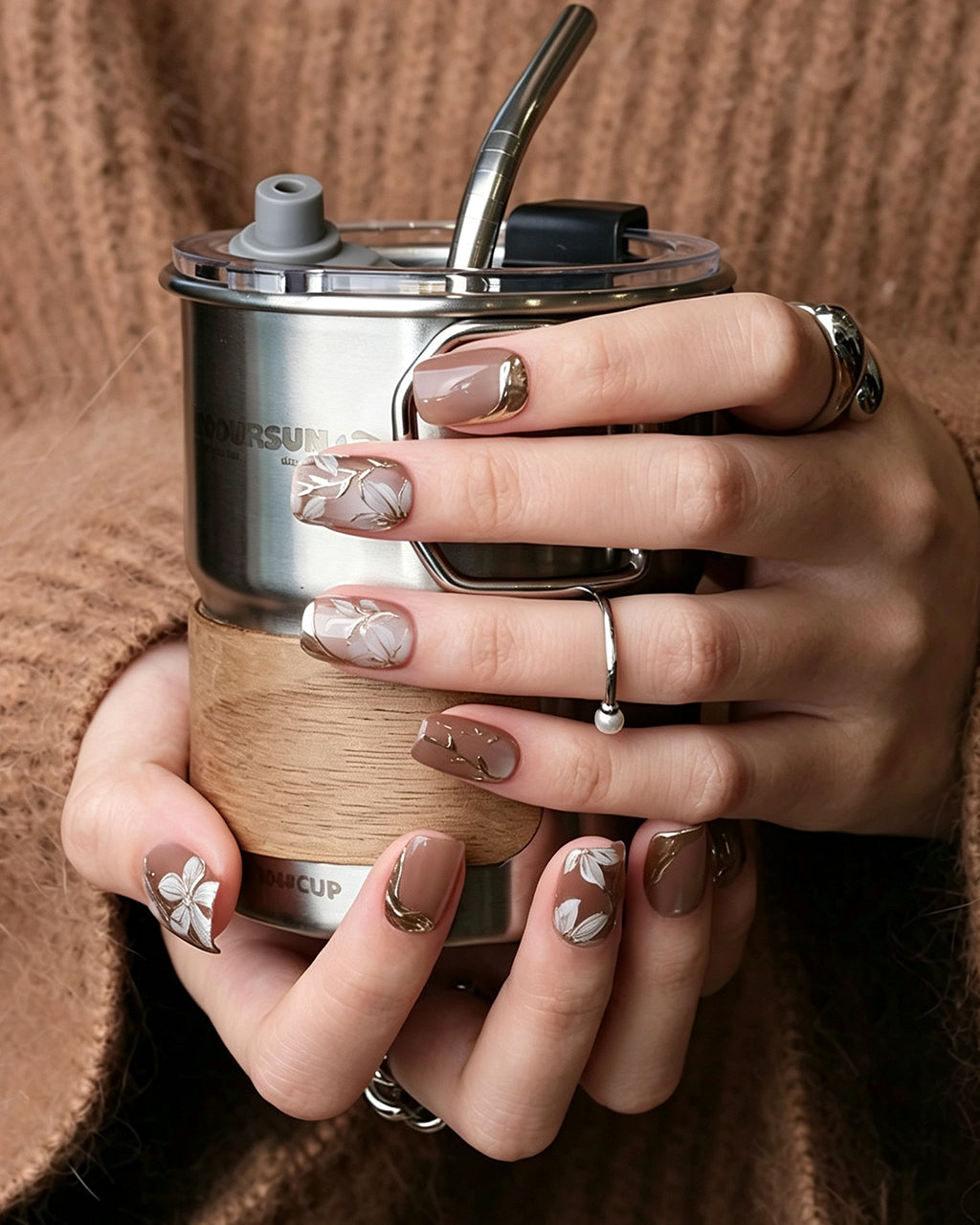 Ice Flower — press-on nails worn on hand