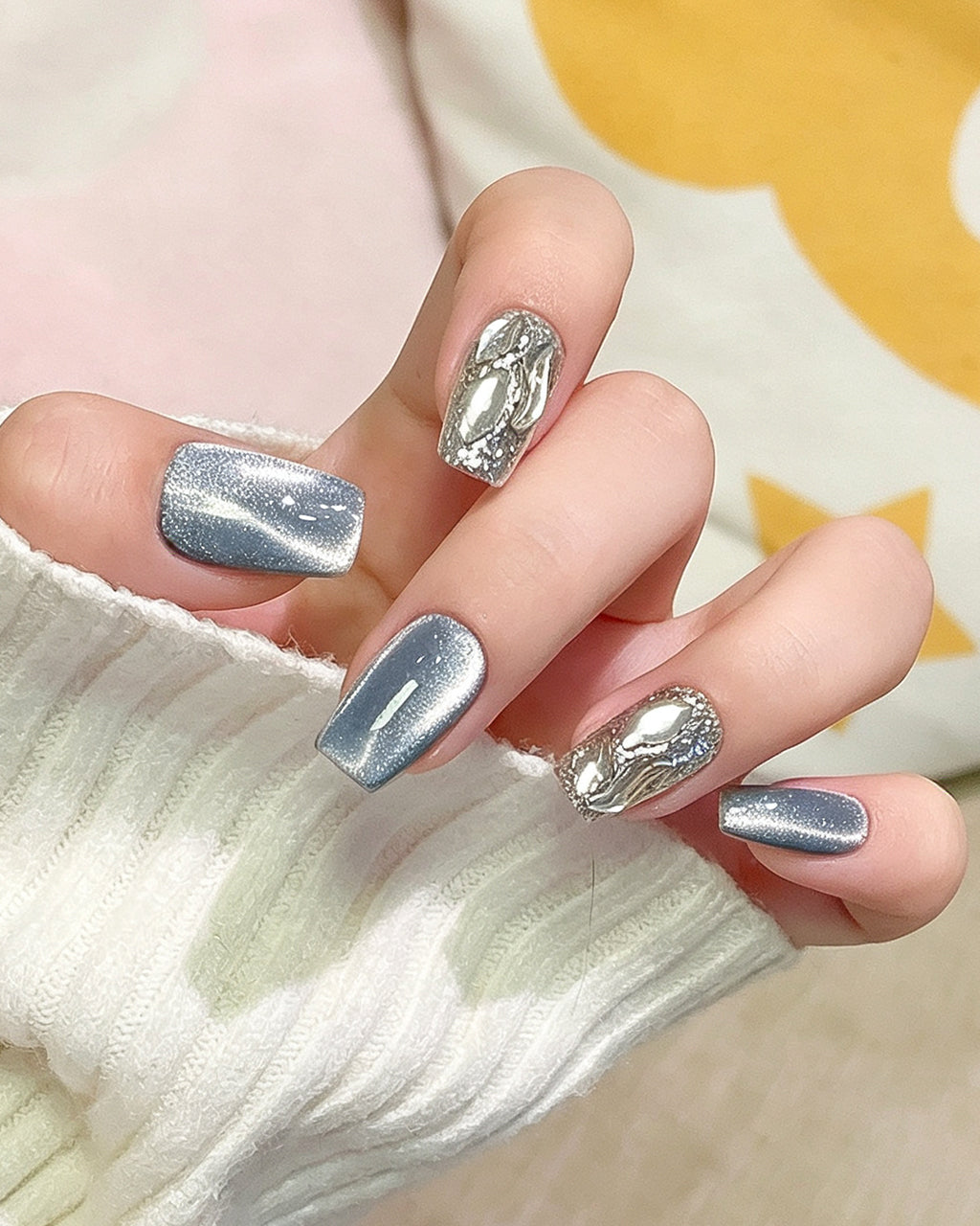 Molten Silver Chrome Cat-Eye Nails — press-on nails worn on hand