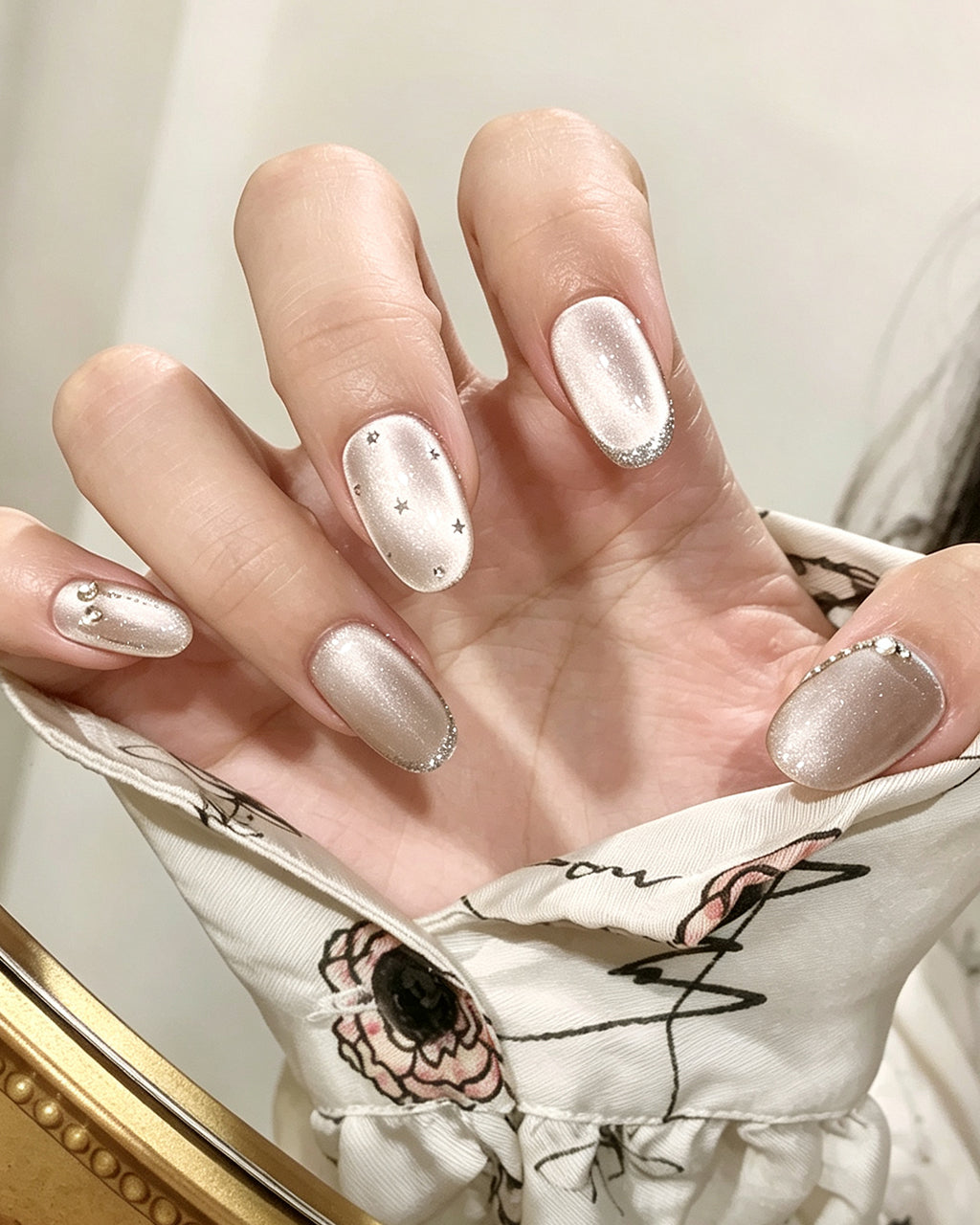 Mist Shrouds Camellia — press-on nails worn on hand