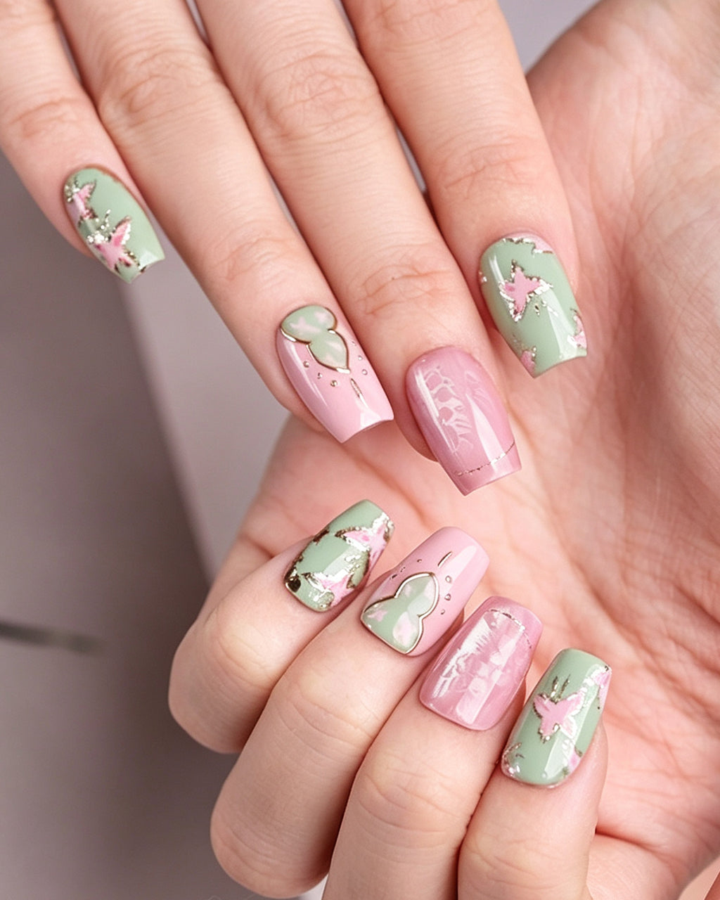 Blessing & Prosperity — press-on nails worn on hand, close view