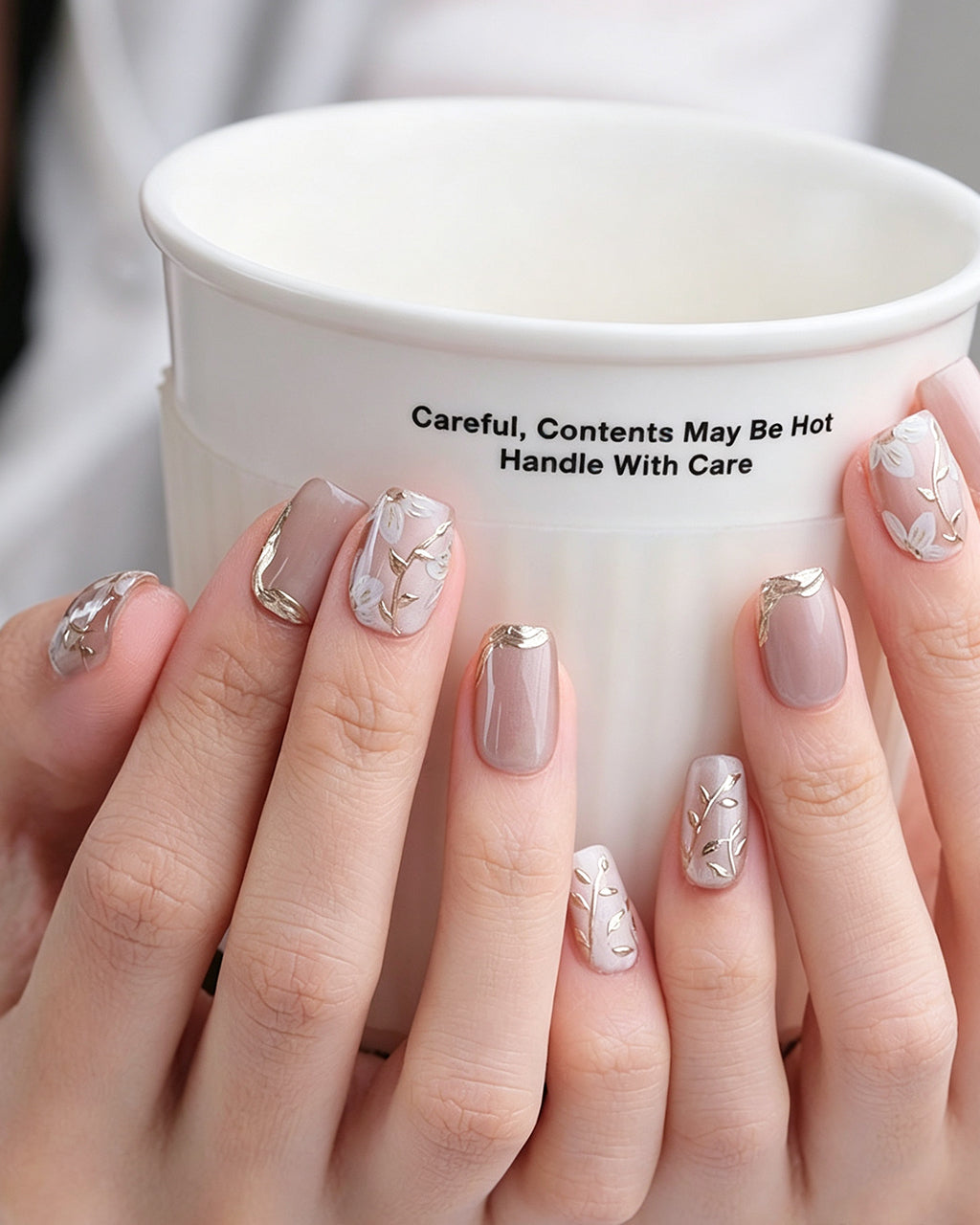 Ice Flower — press-on nails worn on hand, close view
