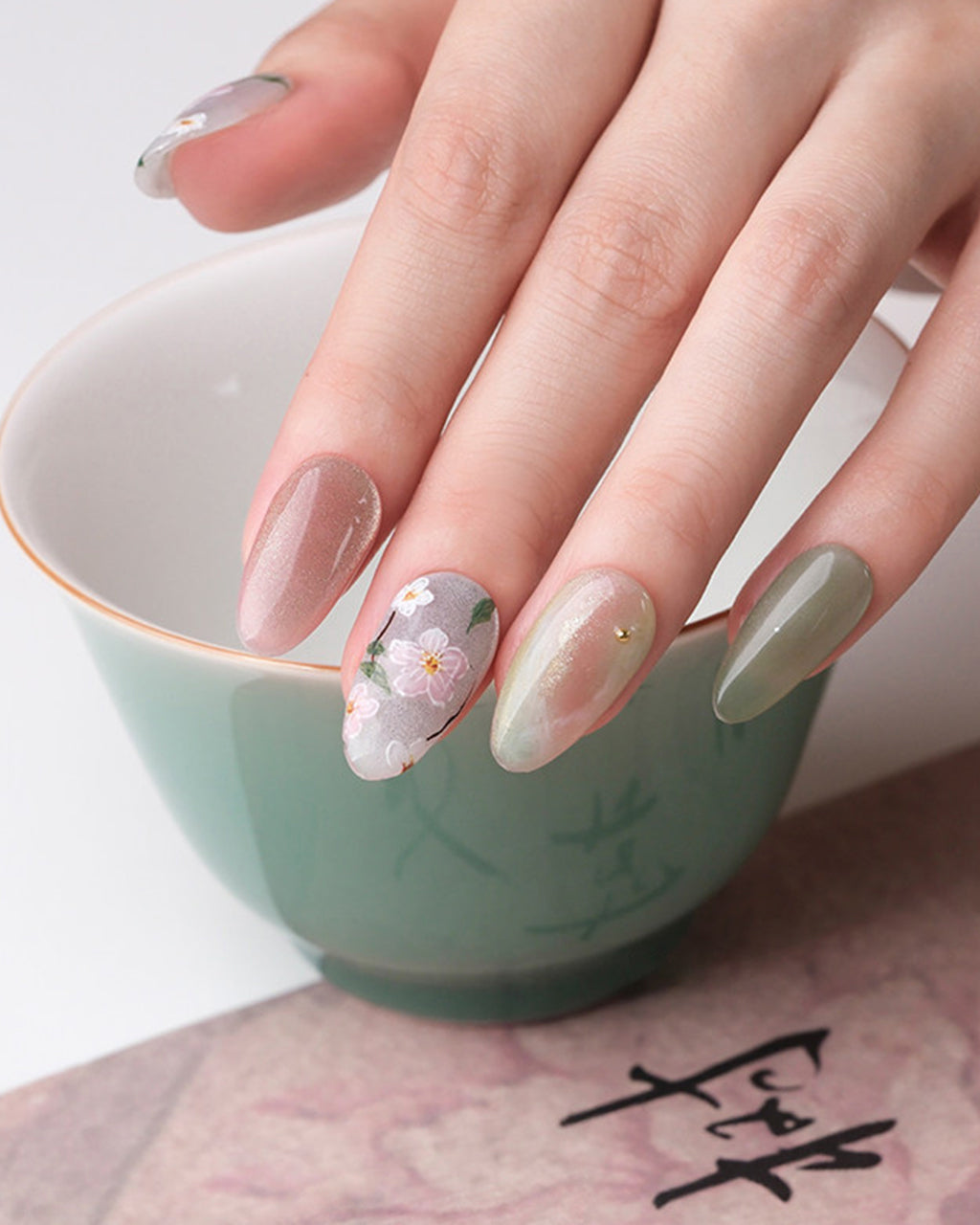 Jasmine Peach — press-on nails worn on hand, alternate angle