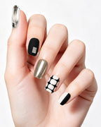 Black and White Tweed — press-on nails worn on hand, close view
