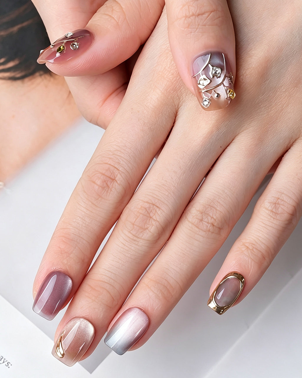 Rhythmic Light — press-on nails worn on hand
