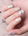 Jasmine Peach — press-on nails worn on hand, close view