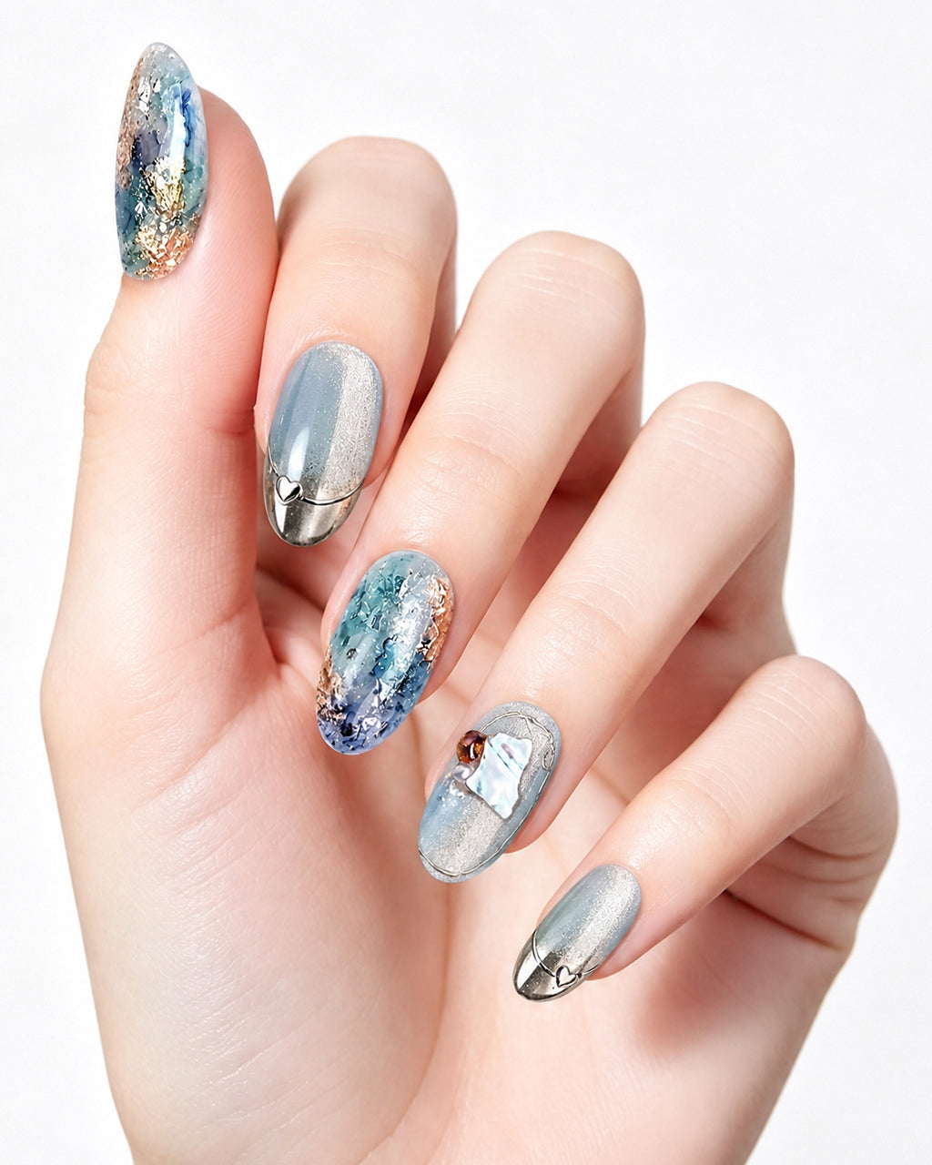 Dew Bubbles | Ice Blue Cat Eye & Chrome French Tip — press-on nails worn on hand, close view