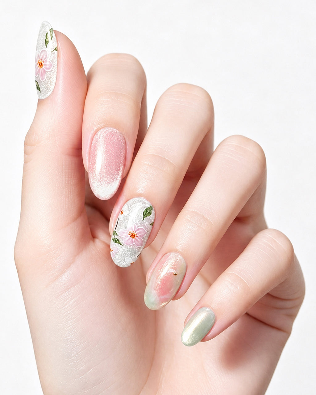 Jasmine Peach — press-on nails worn on hand, close view